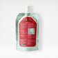 Back of Canine Craving Chicken Broth 150 ml pouch with product information