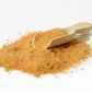 Holistic Bone & Joint Care dog supplement powder close-up with wooden scoop