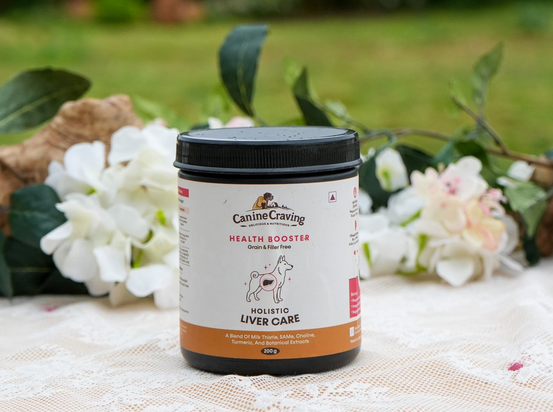 Canine Craving Holistic Liver Care dog supplement jar, 200 g, outdoor lifestyle shot