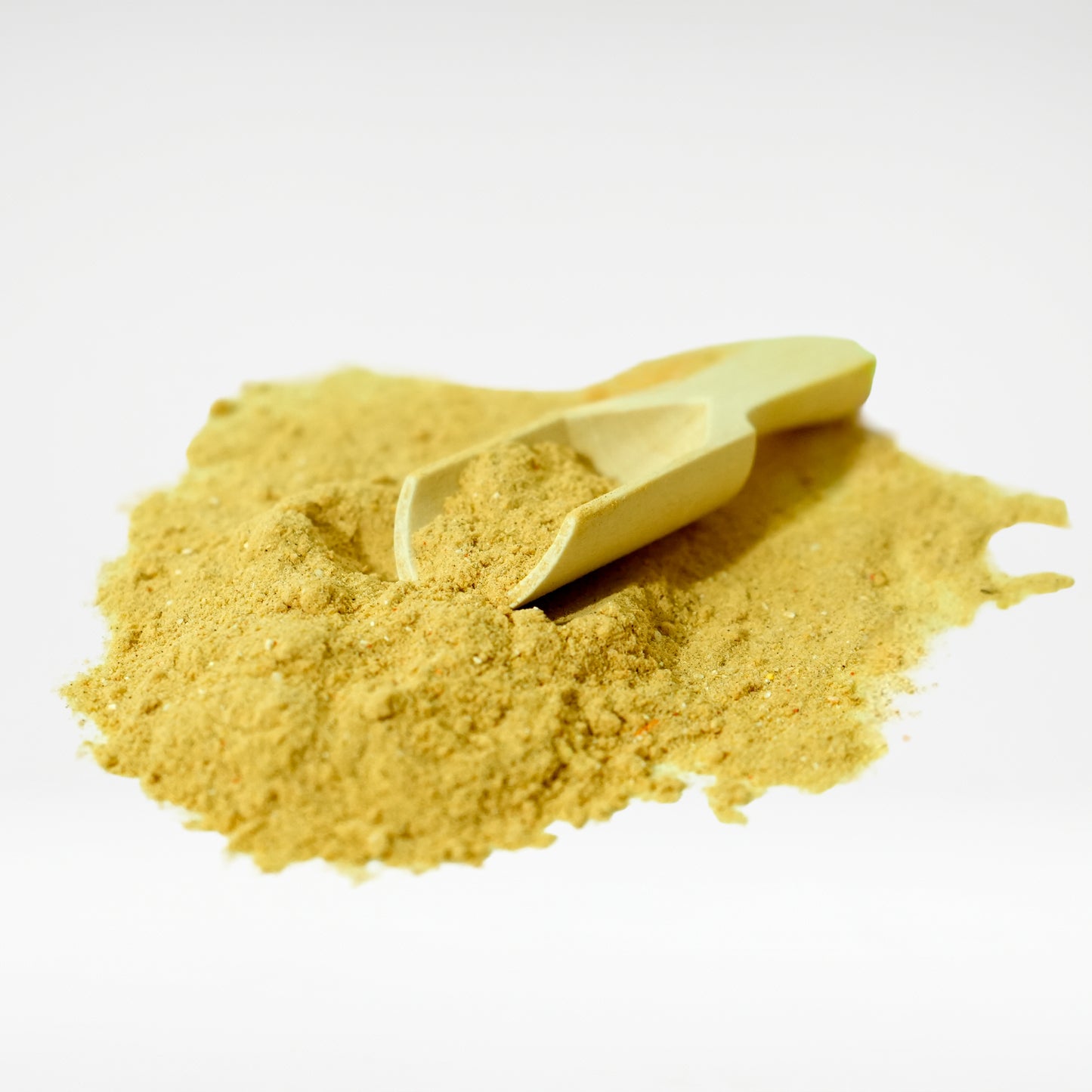 Holistic Liver Care dog supplement powder close-up with wooden scoop